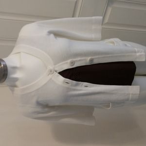 Carolyn Taylor butter soft cardigan in cream color.front pockets 3/4 sleeves